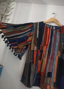 Vibrant Striped Blouse with Tassel Trim