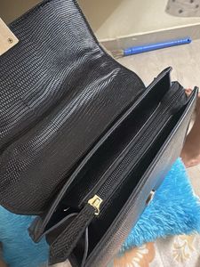 Chic Black Textured Shoulder Bag with Gold Chain
