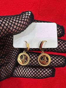 Gold Tone Hoop Earrings with Crystal Accent