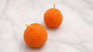 Orange "Modak  Candles "