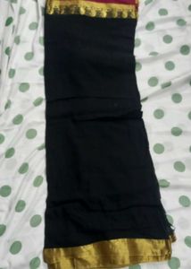 Elegant Black Saree with Golden Border