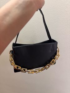 Chic Black Handbag with Gold Chain