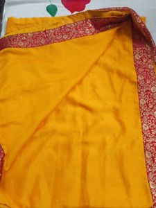 Vibrant Yellow Saree with Red Border