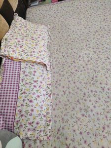 Bedsheet with pillow covers.