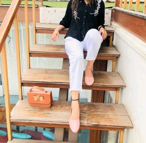 Black Shirt And White Trouser