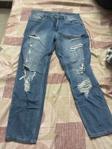 Distressed Blue Denim Jeans