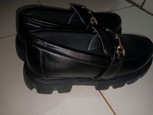 Black Loafers with Gold Detail