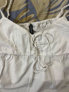 White peplum top