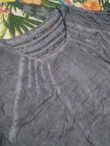 Elegant Blouse with Embellished Neckline