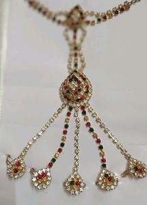 Bracelet With Attached Finger Ring