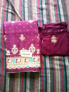 Elegant Purple Crape Suit with Intricate Embroider