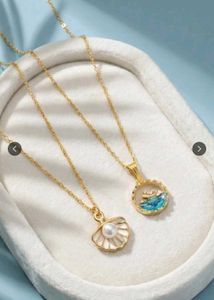 2 Charming Pearl Shell & Boat Pendant Necklaces