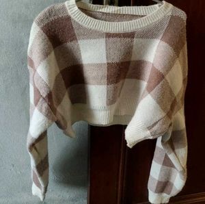 its a short woolen sweater
