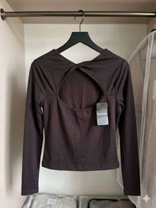 Branded back  Cut-Out Long Sleeve Top