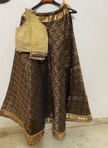 Beautiful black &amp; gold lehenga set with matching g