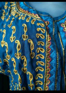 Elegant Teal Gown with Gold Embroidery