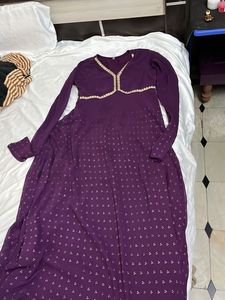 Elegant Purple Gown with Gold Print