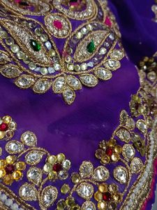 A Purple Blue Saree With Heavy Work