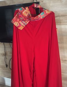 Red plazzo with stone work multi colour top