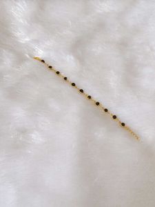 Gold-Tone Bracelet with Black Beads