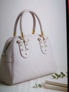 Chic Cream Patent Leather Handbag