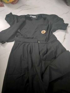 Chic Black Puff Sleeve Wrap jumpsuit.
