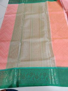Elite orange green saree...