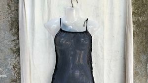 69. Black sheer bodycon