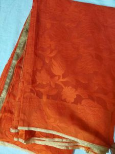 Vibrant Orange Saree with Golden Border