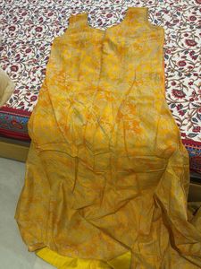 Ethnic yellow gown with shrug and dupatta
