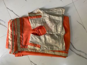 Elegant Orange Saree with Golden Border