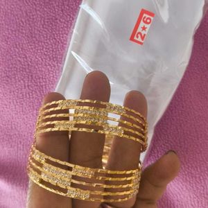 Elegant Gold Bangles with Crystals