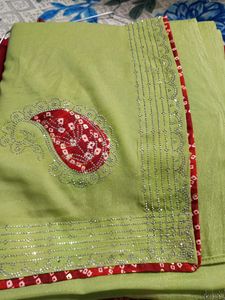 Elegant Lime Green Saree with Red Bandhani Border