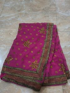 Stunning Pink Saree with Gold Embellishments