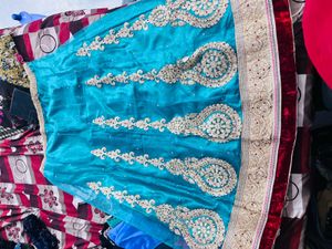 Stunning Teal Lehenga with Pink Dupatta