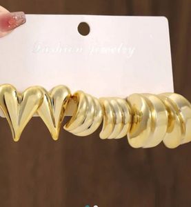 Chic Gold Heart &amp; Swirl Earrings