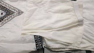 Elegant White Kurta with Embroidered Neckline