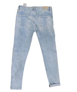 Skinny Fitting Torn Jeans