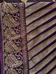 Elegant Purple Saree with Gold Stripes