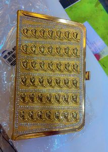 Elegant Gold Clutch with Embellishments