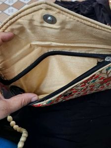 Embroidered sling Bag