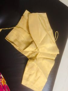 beautiful golden embroidery border orange saree