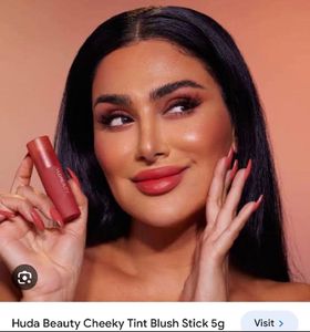 HUDA BEAUTY Cheeky Tint Blush Stick “CORAL CUTIE”