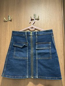 skirt, 2 tops. wore once. very good condition