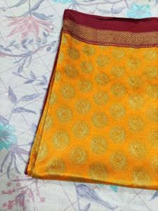 Vibrant Yellow Saree with Peacock Motif