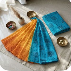 Lovely green and yellow bandheej Saree