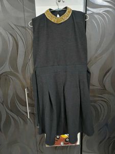 Elegant Black Dress with Embellished Neckline