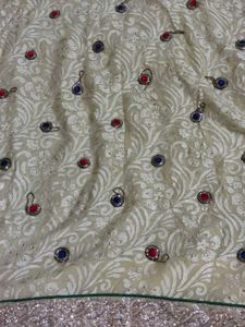 Elegant Beige Embroidered Saree