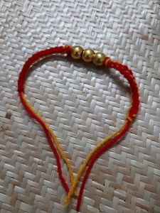 Rakhi // Red & Gold Beaded Bracelet