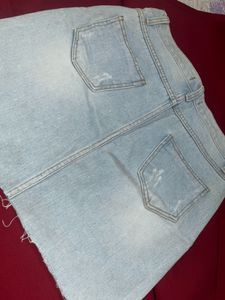 Light Wash Ripped Denim Skirt